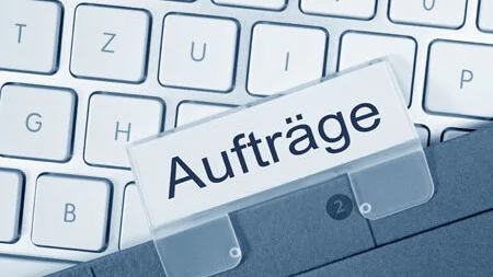 Einen reibungslosen Informationsaustausch zwischen unterschiedlichen Unternehmen beschreibt die verteilte Auftragsabwicklung.